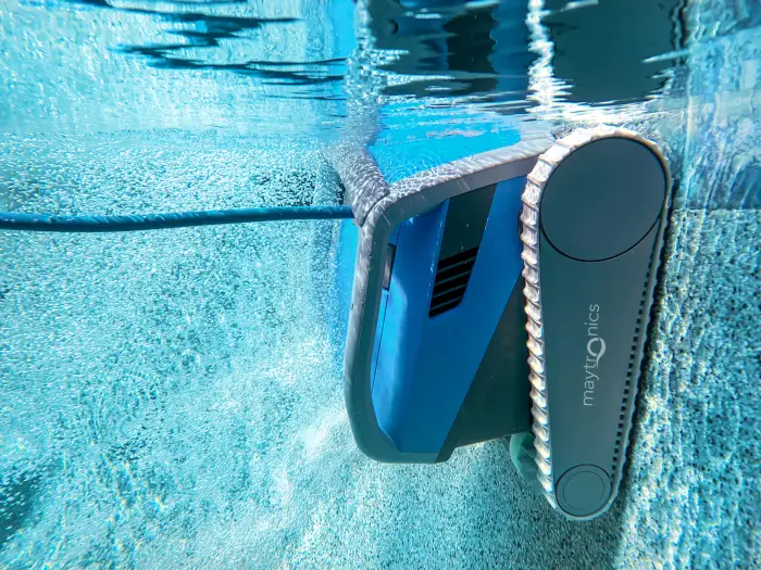 maytronics_dolphin_m600_robotic_pool_cleaner_climbing_pool_wall_underwater-image Magnesium Pools